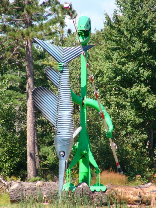 A dinosaur catching a fish.