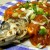 escabeche with onion leaves topping escabeche with onion leaves topping