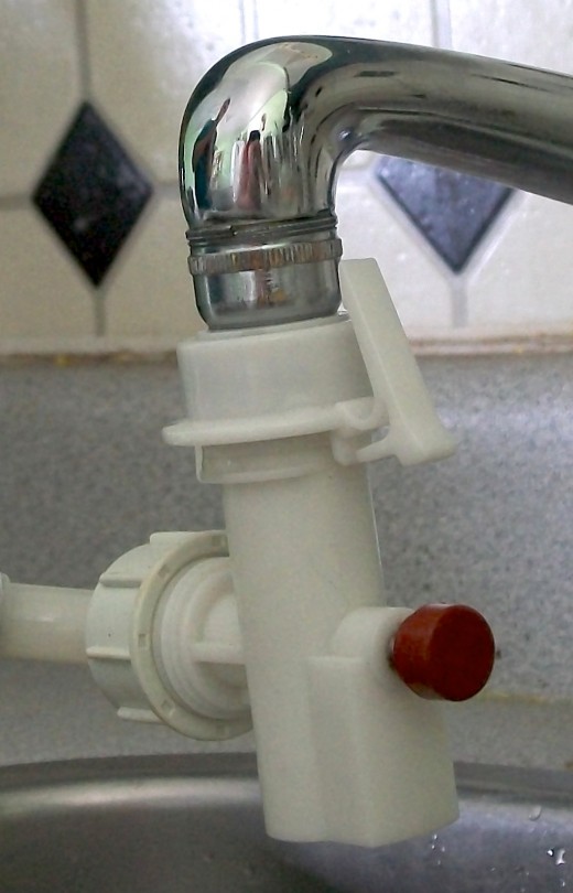 #5) ... and make sure the tab snaps into place over the adaptor and locks.