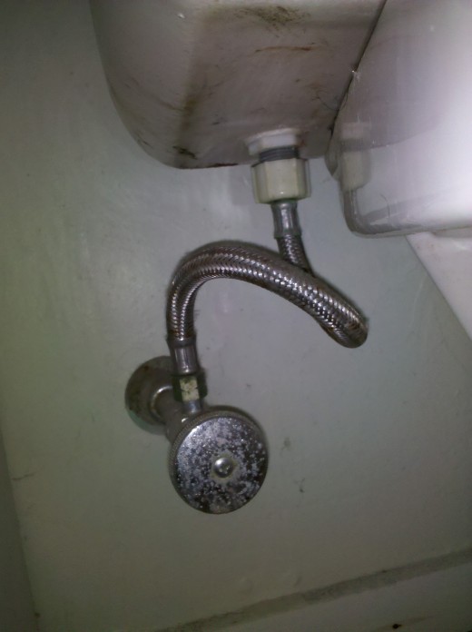 Toilets are actually called "Water Closets" in the field. This is a photo of the shut-off valve underneath the tank.