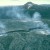 Kupaianaha lava lake in foreground, Pu'u O'o in background, 1990. In 1991-1992, Kupaianaha drained and died, and a lava pond returned to Pu'u O'o's summit crater.