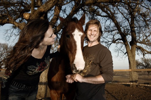 Rupert and Kristin pose with their horse 