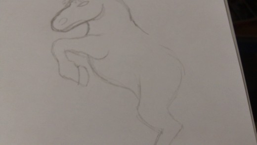 The bottom leg is drawn and shows the Pony figure standing on it's back legs so that when you come to draw in the wings they'll look more effective.
