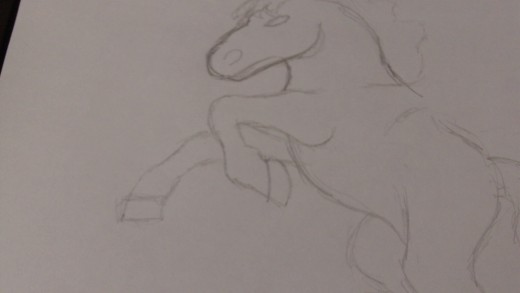 Now draw in the other front leg that stretches out like a Pony or a Horse would if standing on it's back legs.
