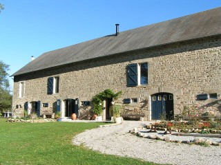 The Barn was completed using stone obtained from a medieval castle that once stood on the site, and built in a traditional French style. It lies in an acre of land reached by a lane serving just the barn and one neighbour. 