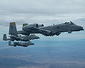 Three A-10 Thunderbolt II aircraft fly in formation over Tucson, Ariz., during an air refueling training mission April 14, 2006. The A-10 aircraft are assigned to the 358th Fighter Squadron at Davis-Monthan Air Force Base, Ariz.