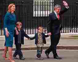 Gordon Brown and familiy leave office,  We imagine with no little relief.