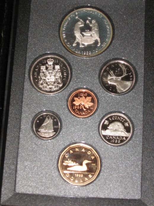 This coin proof set display, never touched by human hands highlights a variety of Canadian coins.