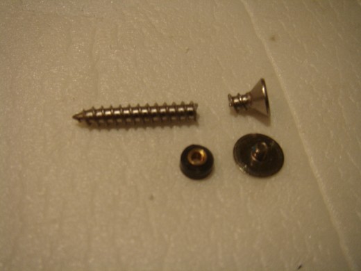 Shortened screw which fits the hole.