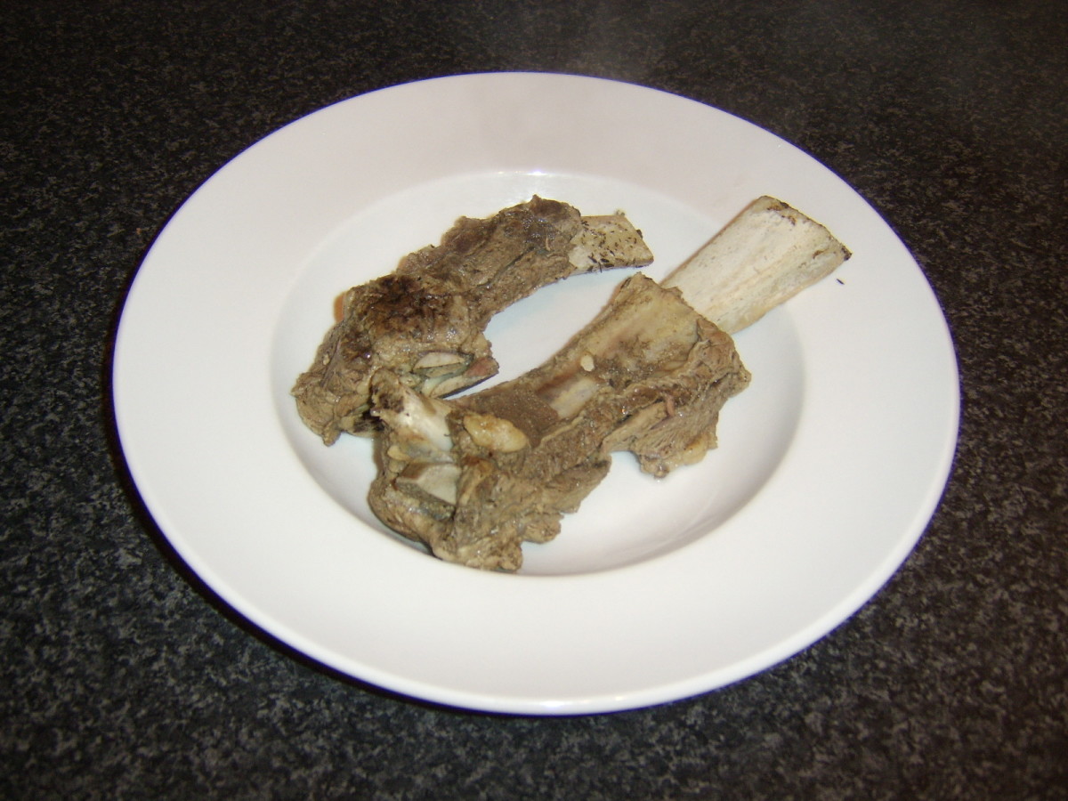 The beef bones are removed from the simmered stock