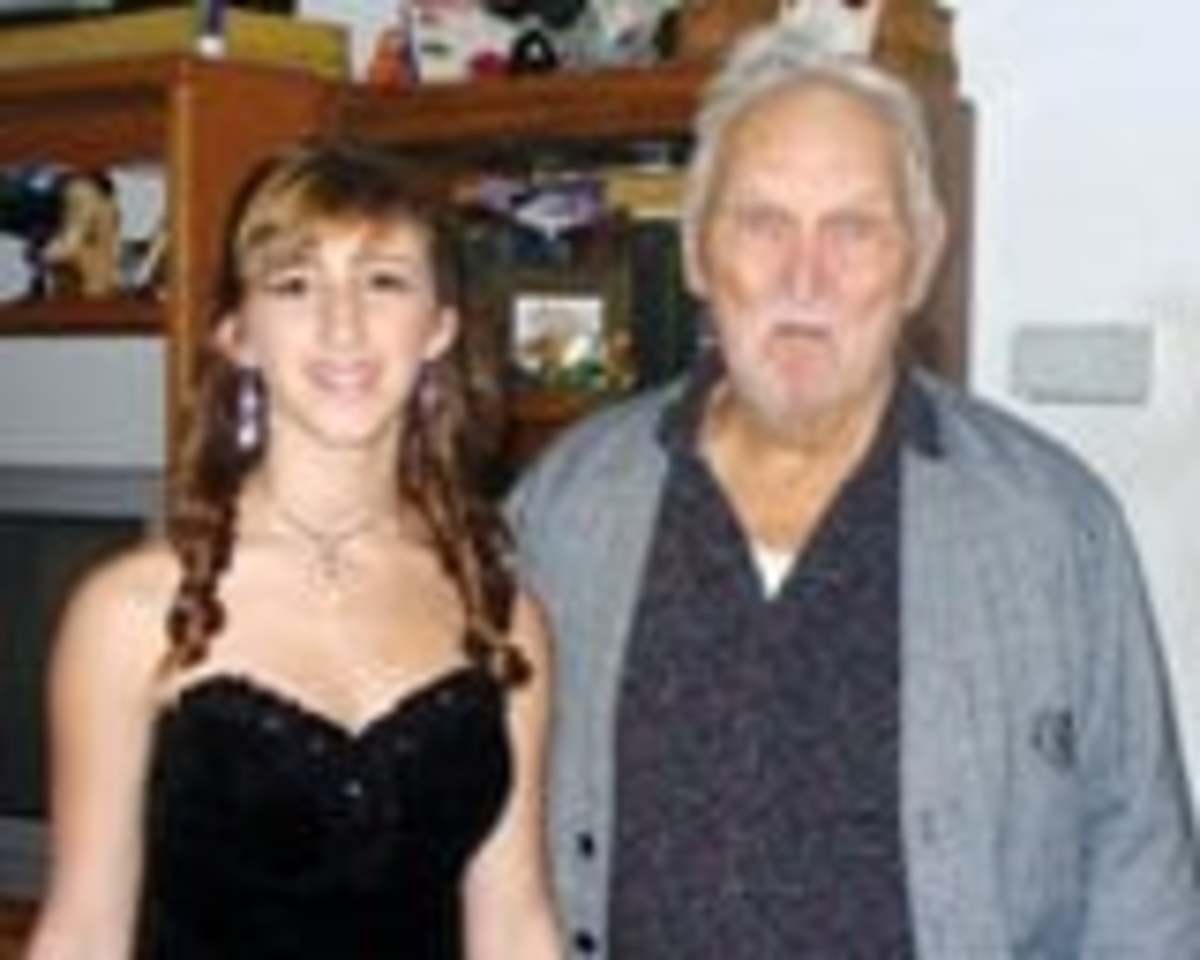 My middle child, Jordan and my dad in February of 2011 before her Winter Formal 