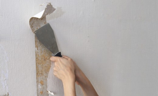 Hand removing wallpaper stock photo. Image of redecorate - 35998084