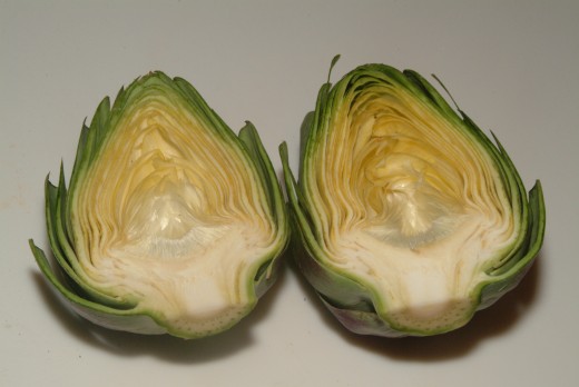 You can slice the artichokes in half and serve two halves to each diner, or steam them whole, serving one whole artichoke per person.
