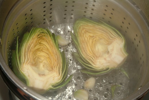Toss a couple of whole garlic cloves into the steamer for an added, yet mild, flavor in your artichokes.