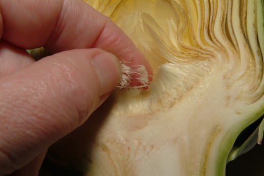 Be sure to remove the thistles from the center of the artichoke, as these should not be eaten.