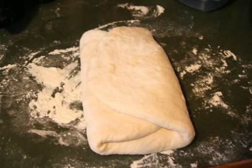 The dough folded in thirds in preparation for he second rise