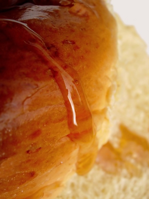 Close up of Challah with drizzle of honey Image:  Fran Fruit|Bigstock.com
