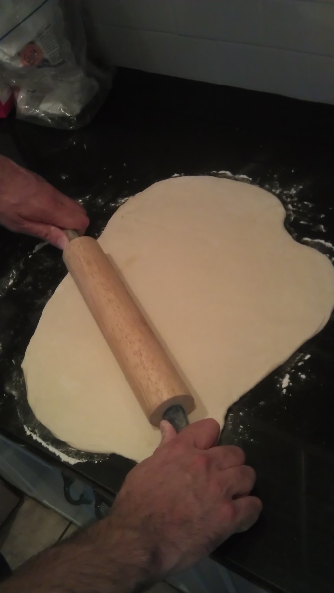 Roll out the dough into a square or rectangle.