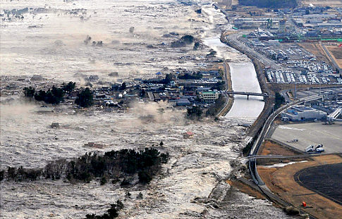 Tsunami waves batter the north east coast of Japan in March 2011