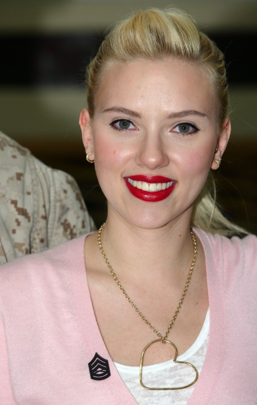 Scarlett Johansson smiles after being pinned with gunnery sergeant rank at Camp Buehring, Kuwait. Jan 20, 2008 (Photo by: Sgt. Bryson K. Jones)