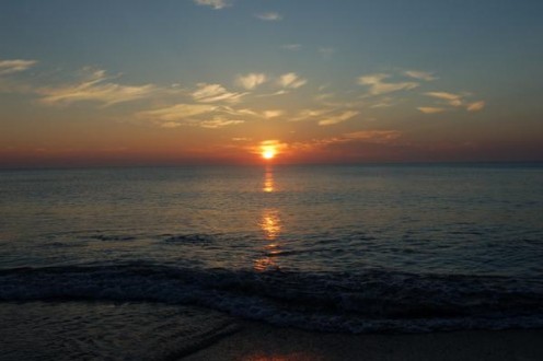 Sunrise at the beach is truly beautiful. On the ocean side of Florida, the sunrises are fantastic.  I often walk along the beach, early in the morning, watching the sun come up, collecting shells with my daughter, taking pictures.    photo by AMB