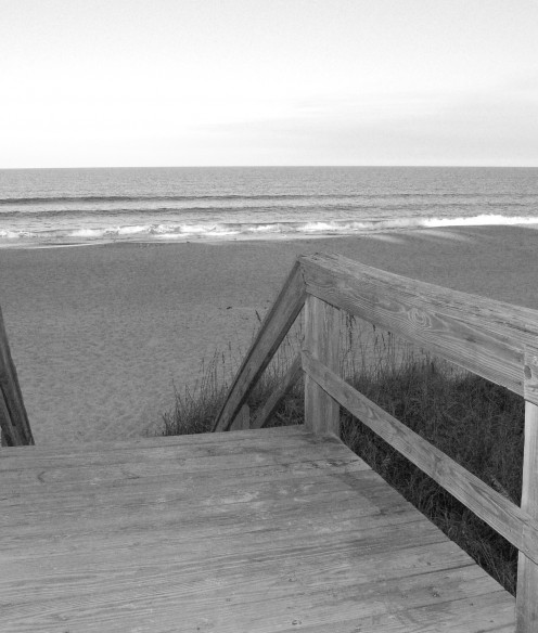 Weathered boardwalk to the beach.  There is such peace to be found staring out at the ocean.  The size of it all, the sounds of the waves, and the beauty of it, it just gives a person a sense of peace.  Everyone should experience it. photo by AMB
