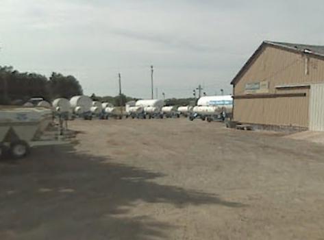 A few miles south of Wichita, a farm products dealer stores fertilizer delivery equipment. The tank trailers are designed to transport pressurized anhydrous ammonia. Places such as these are targets for meth cookers.