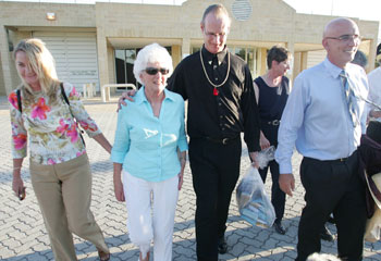 Mallard walking from Casuarina maximum security prison with his mum, Coleen Egan and John Quigley