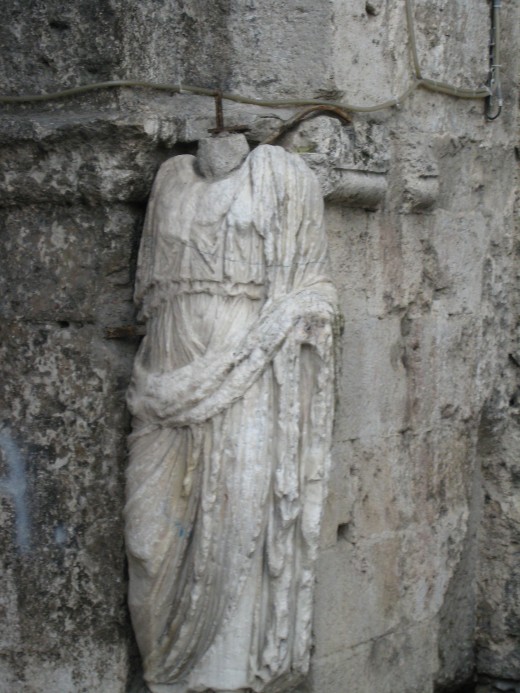 Original statue carved on the gates of the entrance to the city of Isernia, Italy.