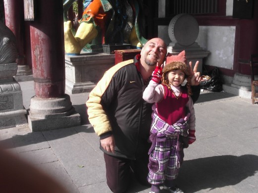 This little sweetheart wanted her picture taken with me. She is from Northern China