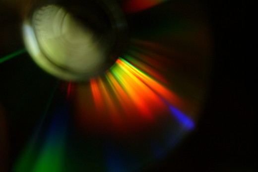CD with colorful light reflection on surface