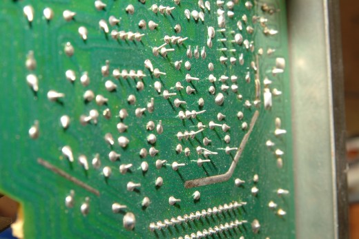 A Sea of PC Board Unclipped and Clipped solder joints