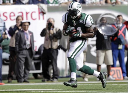 New York Jets' LaDainian Tomlinson runs with the ball during the second quarter of an NFL football game against the San Diego Chargers, Sunday, Oct. 23, 2011, in East Rutherford, N.J. (AP Photo/Kathy Willens)