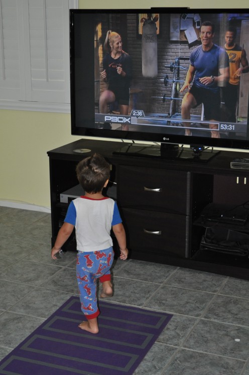 Here is Max doing a little morning workout with Tony Horton. 