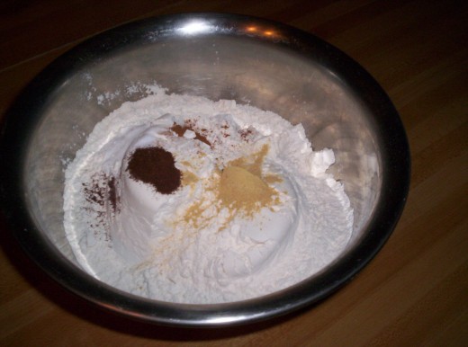 The dry ingredients are mixed together in a large bowl.