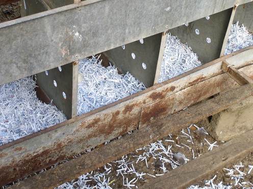 Double decker nesting boxes filled with shredded paper.