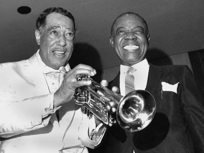 Trumpet: A slightly older Duke with Louis Armstrong, right
