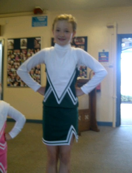 My daughter at cheerleading class.