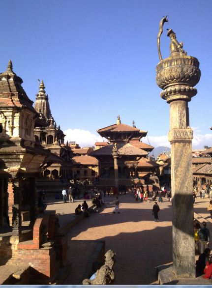 Old Royal Palace Plaza in Patan City. Patan is adjacent to Kathmandu and it is one of the four cities in Kathmandu valley. Kirkpatrick, a British historian, wrote there are more temples than the number of houses and more deities than the people.