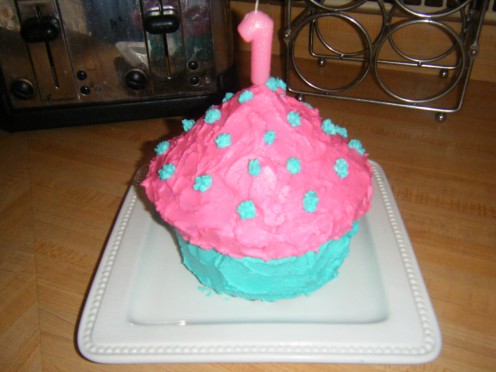 A cupcake smash cake is a cute idea for a first birthday.