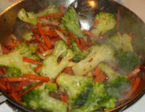 Carrots, broccoli, onions & garlic in sauté pan.