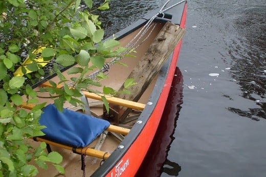 In my canoe, an old portage cart left behind by a careless user.  Please remember to leave the wilderness a better place than you found it. 