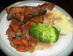 Slow cooked lamb Shanks braised in red wine with rosemary