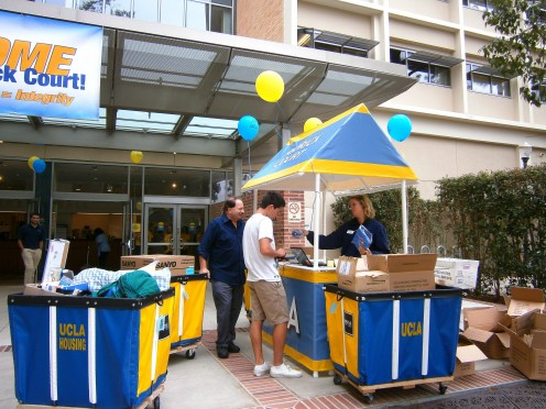 Moving carts and checking in--move-in day can be busy and crazy.