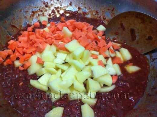 Add the potatoes and carrot.