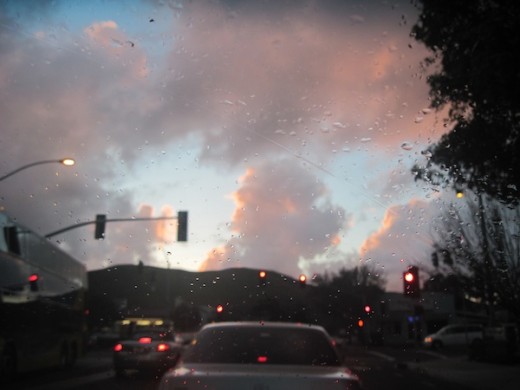 A rainy evening in San Luis Obispo, taken from car while stopped at this traffic light.