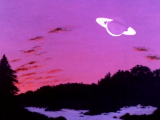 Evening Sky (Painting by Carl Martin. Earth-like planet and ringed moon in the 54 Piscium system.) 