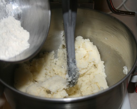 When the butter & sugar look light & fluffy, you've mixed them enough. It's time to add the flour & salt.