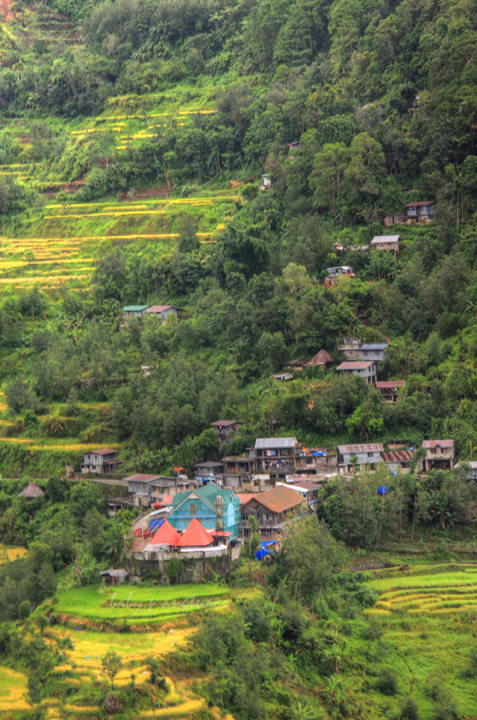groups of houses along the base of the rice terraces Please click on the photo for a bigger view