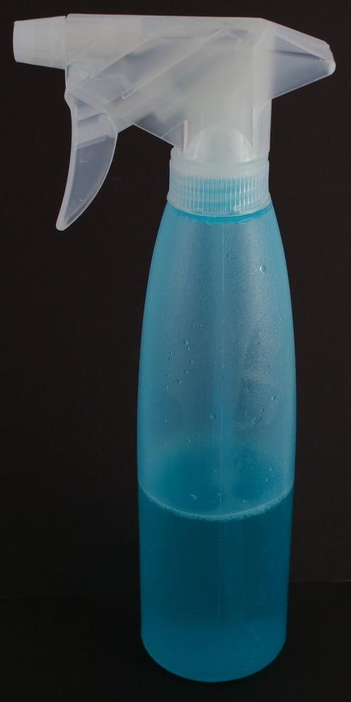White vinegar in a dollar store spray bottle.